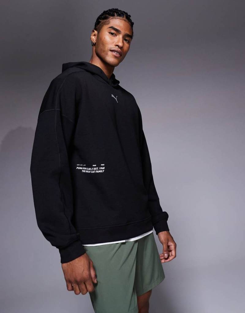 PUMA - Run Club - Unisex-Kapuzenpullover in Schwarz von Puma