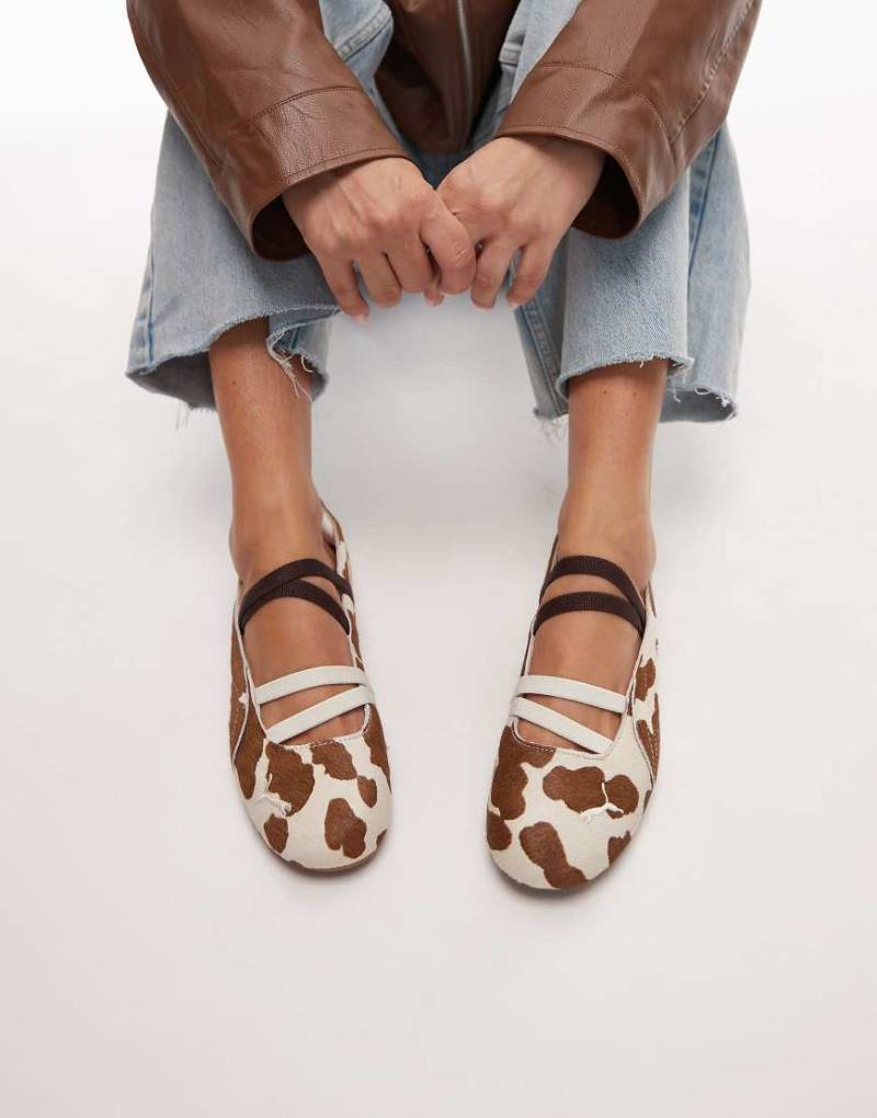 PUMA - Speedcat - Flache Ballerinas mit Kuhmuster-Weiß PUMA - Speedcat - Flache Ballerinas mit Kuhmuster-Weiß von Puma