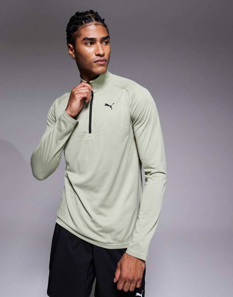 PUMA - Tad Tech - Sport-Oberteil aus Materialmix in Grün mit kurzem Reißverschluss PUMA - Tad Tech - Sport-Oberteil aus Materialmix in Grün mit kurzem Reißverschluss von Puma