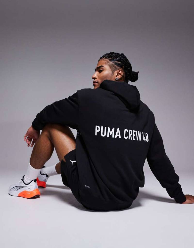 Puma - Kapuzenpullover aus French Terry in Schwarz mit Print von Puma