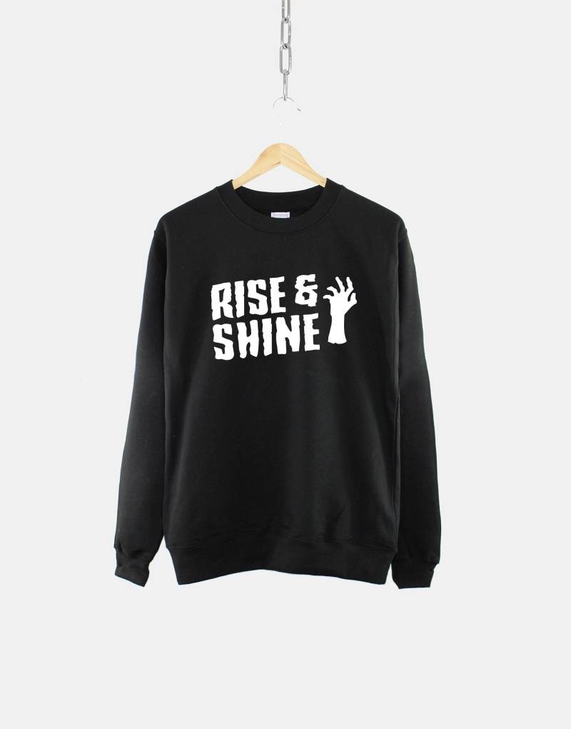 Rise & Shine Zombie Goth Kleidung Rundhals Sweatshirt - Halloween Pullover von QuriousShop