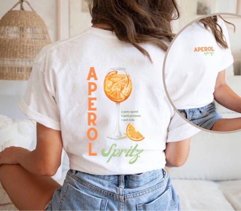 Aperol Spritz Vintage Tshirt/Glass Graphic Alcohol Cocktail Ingredients Shirt Best Friend Gift Boho Pinterest Aesthetic T-Shirt Aperol Spritz Vintage Tshirt/Glass Graphic Alcohol Cocktail Ingredients Shirt Best Friend Gift Boho Pinterest Aesthetic T-Shirt von RISCStudios