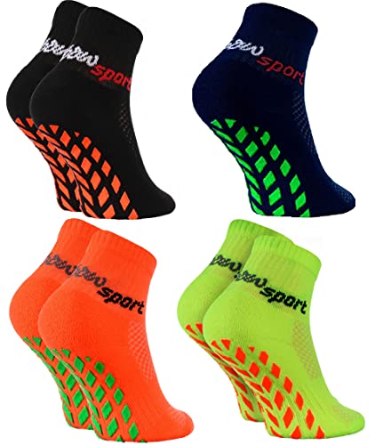 Rainbow Socks - Jungen Mädchen Neon Sneaker Sport Stoppersocken - 4 Paar - Schwarz Orange Grün Blau - Größen 24-29 von Rainbow Socks