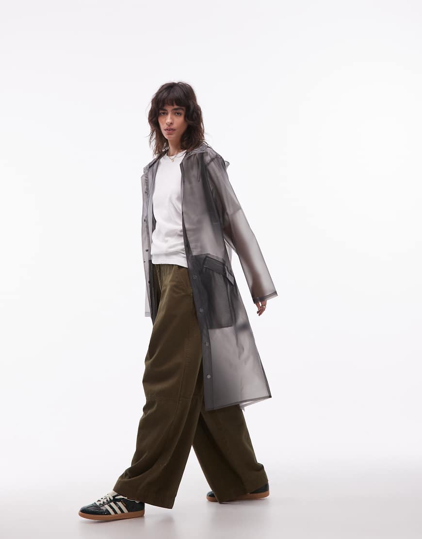 Rains - 18360 - Wasserdichte lange Jacke aus leicht transparentem Schwarz von Rains