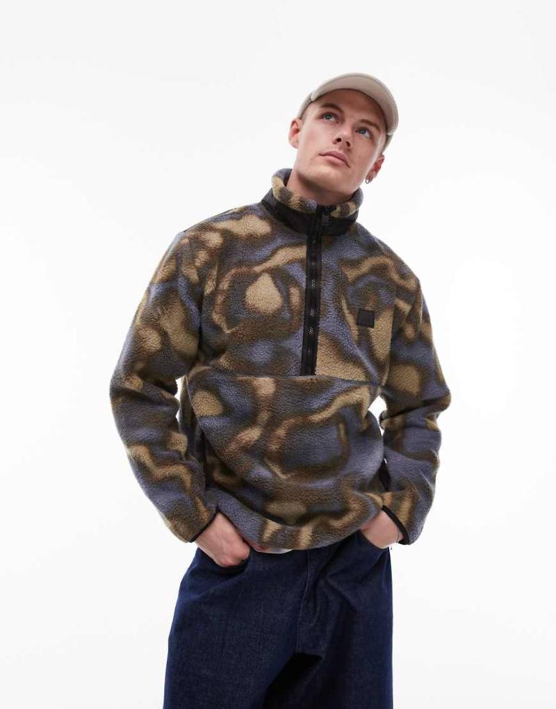 Rains - Yermo - Fleece-Pullover in Schwarz mit kurzem Reißverschluss und Print-Bunt von Rains