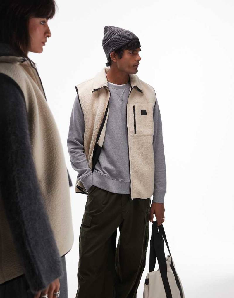 Rains - Yermo - Unisex-Weste aus schwerem Fleece in Creme-Neutral Rains - Yermo - Unisex-Weste aus schwerem Fleece in Creme-Neutral von Rains