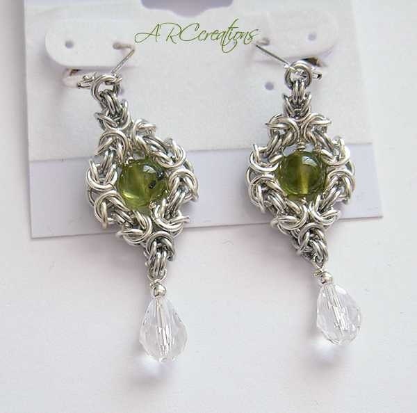 Peridot Und Swarovski Kristall Ohrringe Sterling Silber Peridot Und Swarovski Kristall Ohrringe Sterling Silber von RaquelChelouche