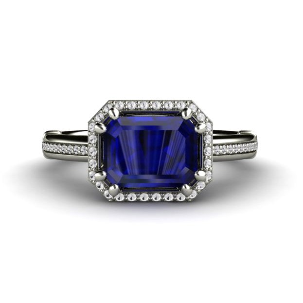 Ost West Saphir Verlobungsring Smaragdschliff Blau Ring Diamant Halo in 14K Gold von RareEarth