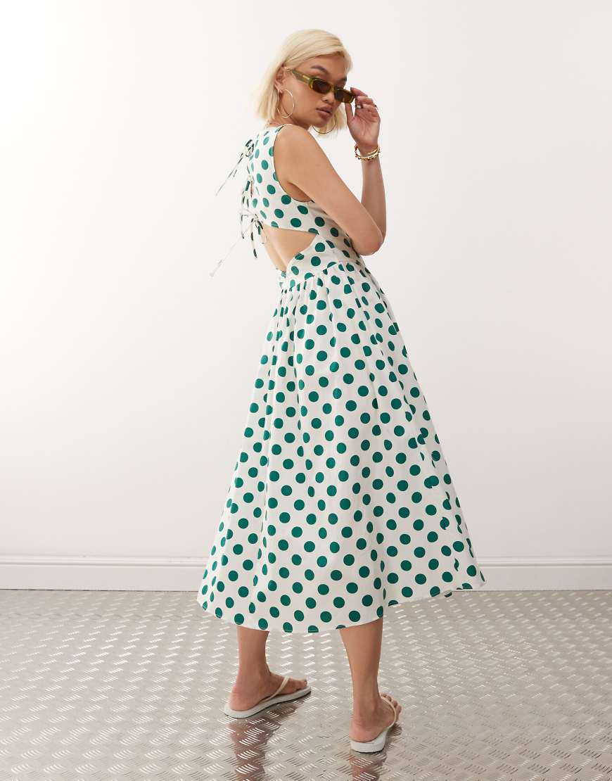 Reclaimed Vintage - Einfarbig gepunktetes Midikleid mit eng anliegendem Oberteil und ausgestelltem Rock-Bunt von Reclaimed Vintage