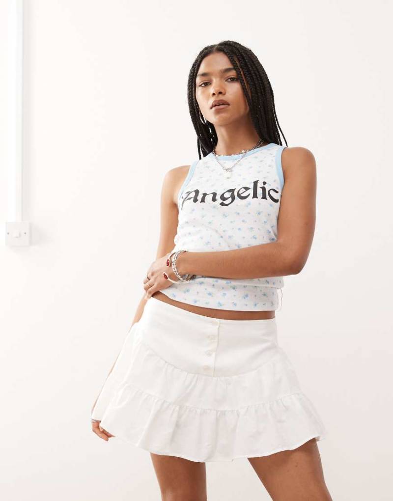 Reclaimed Vintage - Gestufter Rüschenrock in Elfenbeinweiß mit tiefer Taille von Reclaimed Vintage