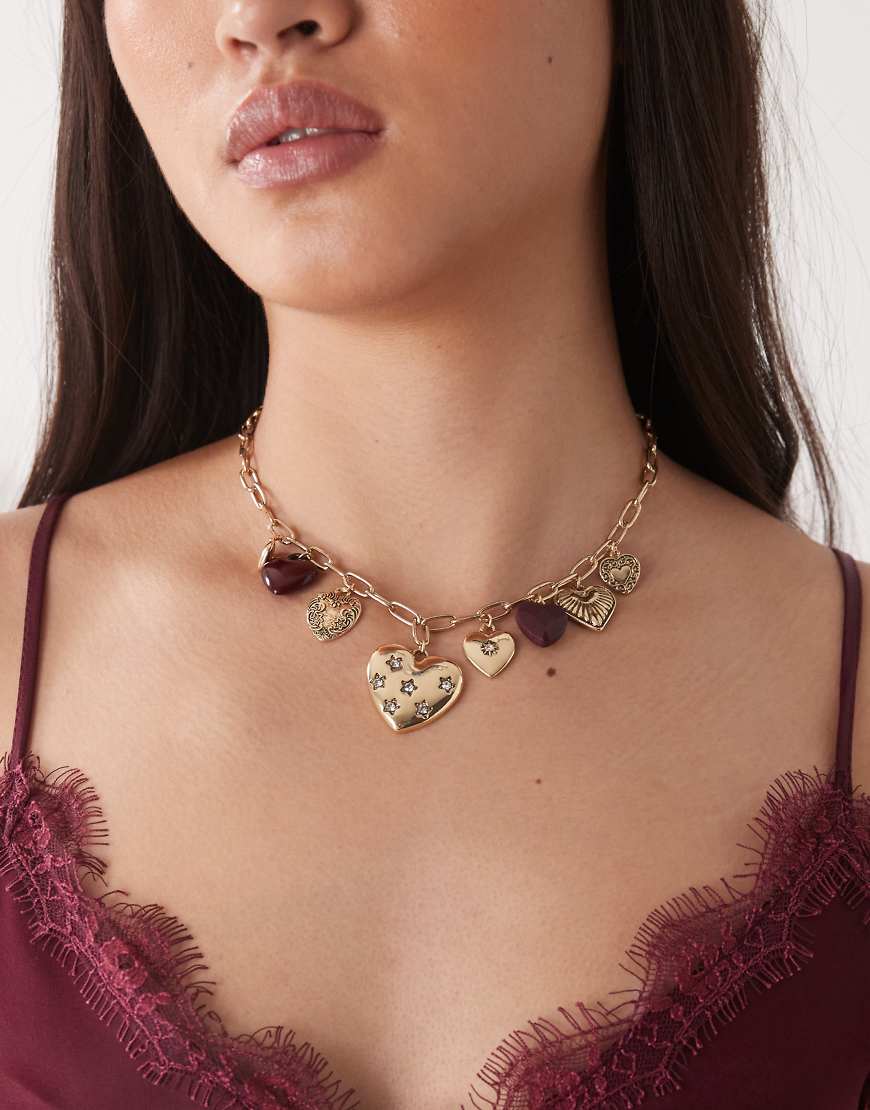 Reclaimed Vintage - Halskette in Goldoptik mit Herzanhängern-Goldfarben von Reclaimed Vintage