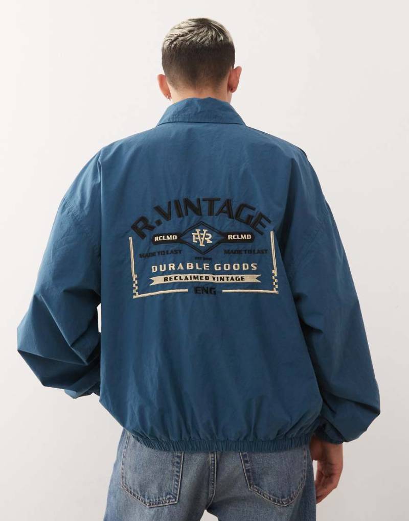Reclaimed Vintage - Harrington-Bomberjacke in Tintenblau mit Stickerei am Rücken von Reclaimed Vintage