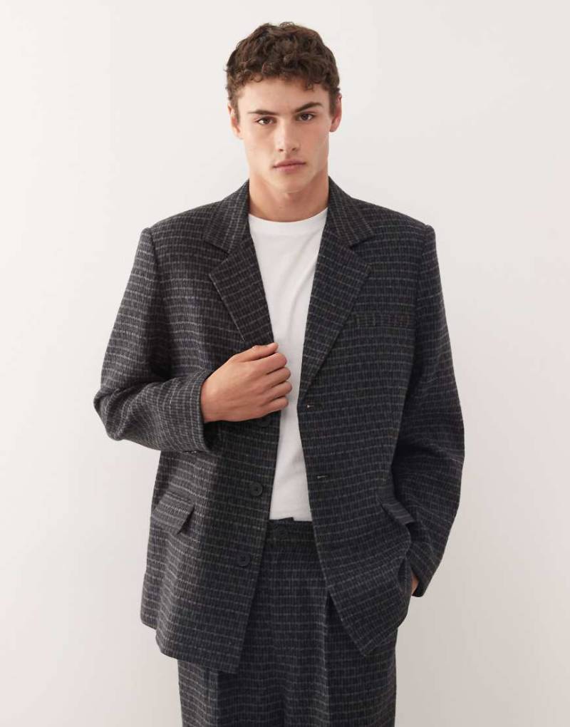 Reclaimed Vintage - Locker geschnittener, kastiger Blazer in Marineblau und Grau kariert, Kombiteil-Bunt Reclaimed Vintage - Locker geschnittener, kastiger Blazer in Marineblau und Grau kariert, Kombiteil-Bunt von Reclaimed Vintage