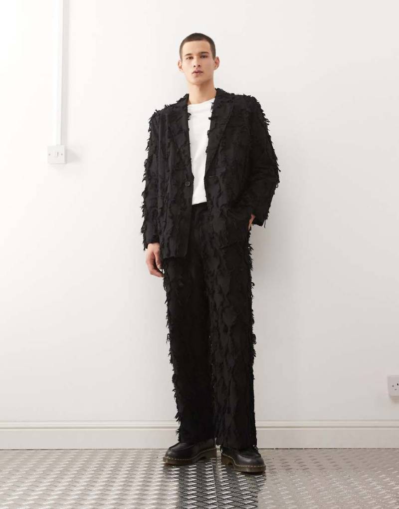 Reclaimed Vintage - Limited Edition - Elegante Hose in Schwarz mit Ausfransungen, Kombiteil von Reclaimed Vintage