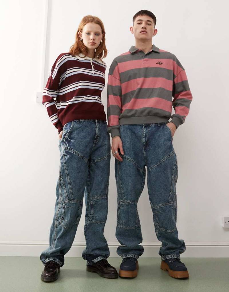 Reclaimed Vintage - Locker geschnittene Unisex-Motocross-Jeans in mittelblauer Waschung von Reclaimed Vintage
