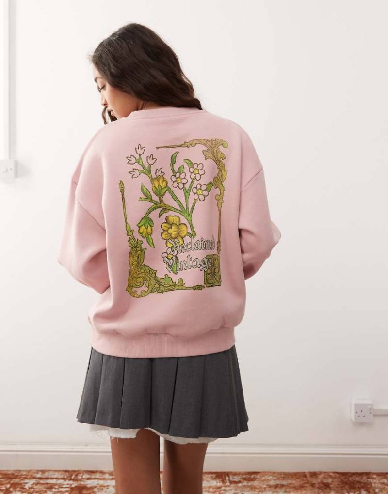Reclaimed Vintage - Sweatshirt in Rosa mit Gothic-Blumenprint-Grün von Reclaimed Vintage