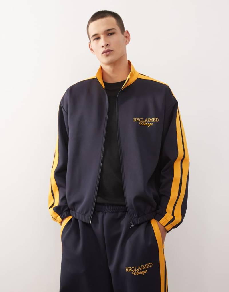 Reclaimed Vintage - Trainingsjacke in Marineblau mit Seitenstreifen, Kombiteil von Reclaimed Vintage