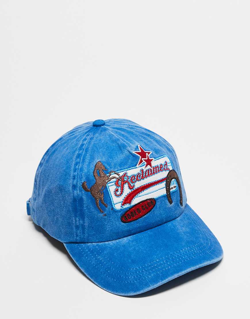 Reclaimed Vintage - Unisex-Kappe in verwaschenem Blau mit Rodeo-Aufnäher im Western-Look von Reclaimed Vintage