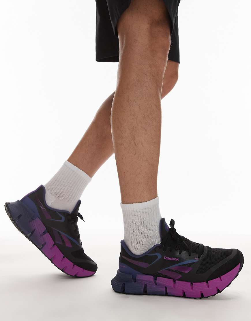 Reebok - Floatzig - Laufschuhe in Schwarz und Lila von Reebok