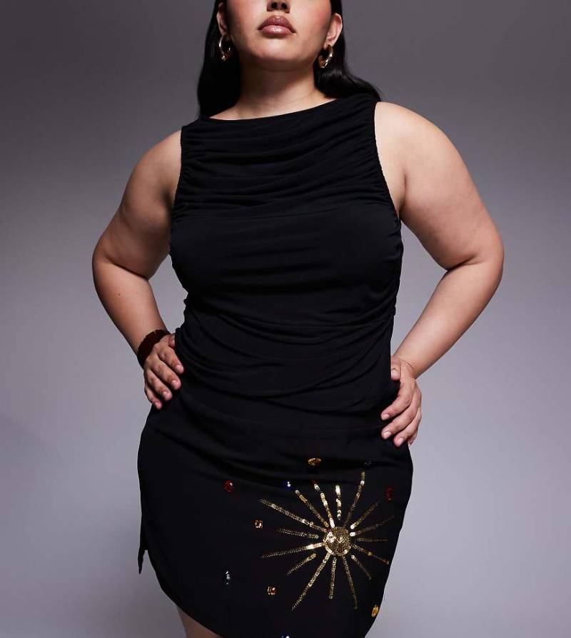 Renée Studio - Minirock aus schwarzem Samt mit Himmelskörperverzierung aus Pailletten und Schmucksteinen mit seitlichem Schlitz von Renee Studio