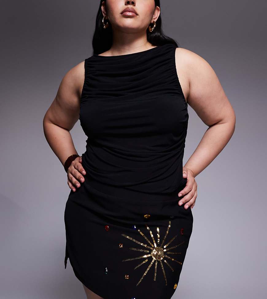 Renée Studio - Minirock aus schwarzem Samt mit Himmelskörperverzierung aus Pailletten und Schmucksteinen mit seitlichem Schlitz von Renee Studio