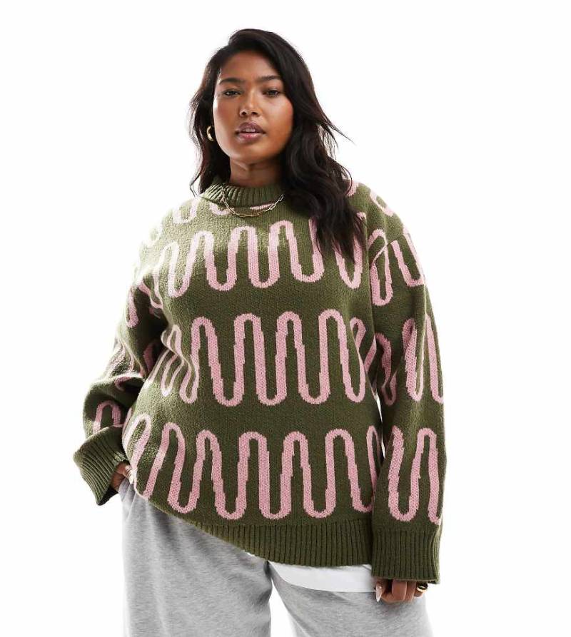 Renee Studio Plus x Holly Wynne - Exklusiver Pullover in Grün mit abstraktem rosa Muster und hohem, geripptem Kragen-Bunt von Renee Studio