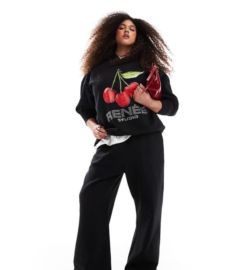 Renee Studio Plus x Michelle Nayla - Exklusive Jogginghose in Schwarz mit weitem Bein und Kontrastband, Kombiteil von Renee Studio