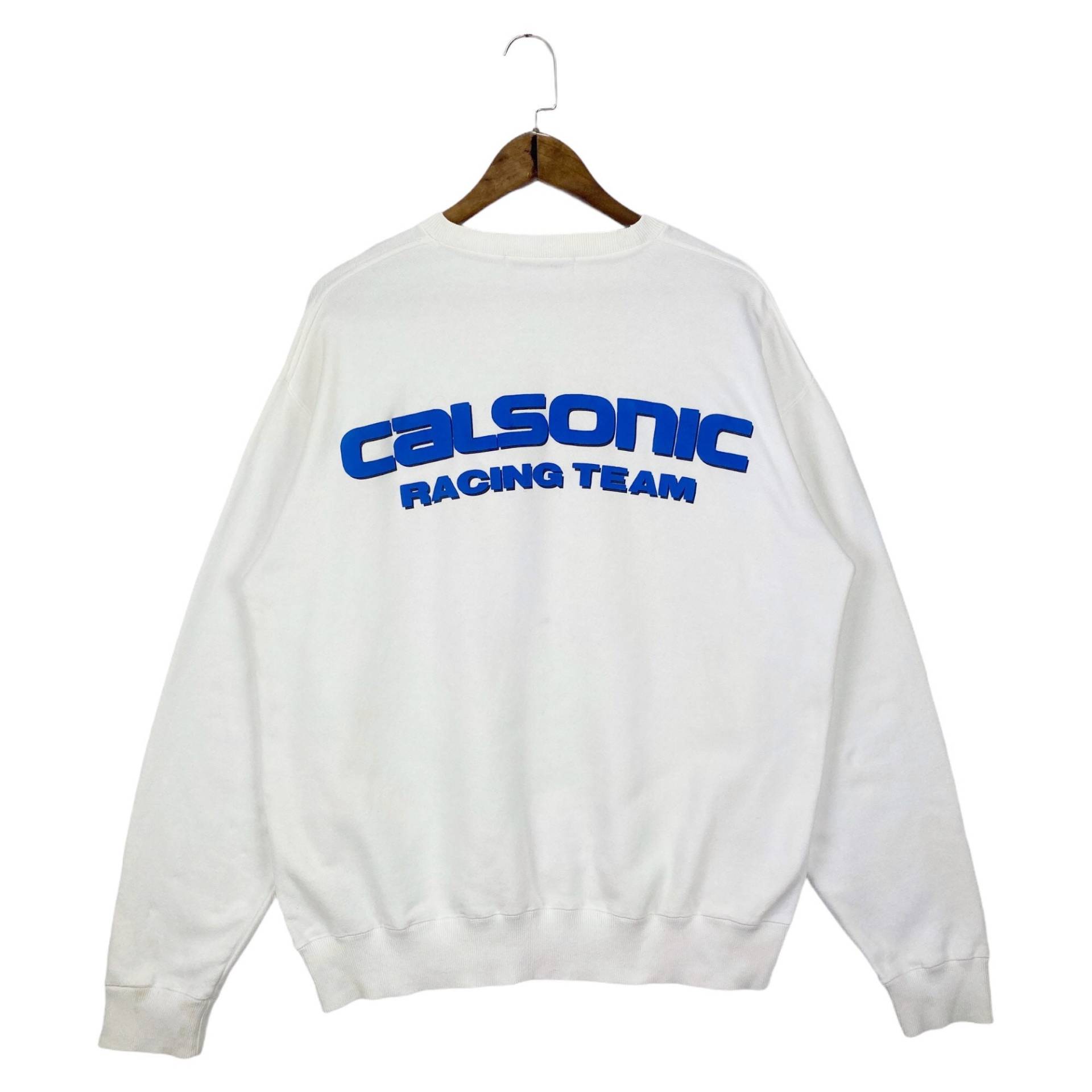 Vintage 90Er Jahre Calsonic Racing Team Sweatshirt Rundhalsausschnitt Big Logo Spellout Weißer Pullover Größe L von RevivalModeWarehaus