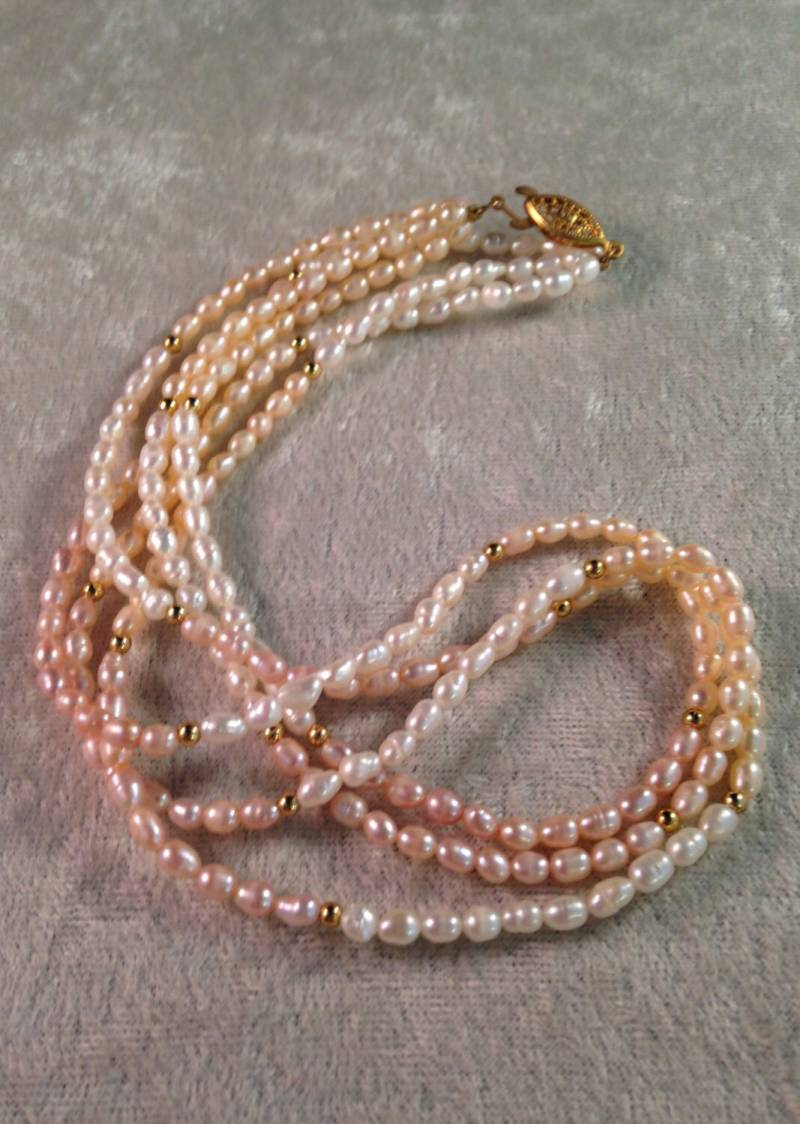 Süßwasser Dreisträngige Weiß Rosa Creme Perlen Halskette Mit Gold Spacern 041Nl Süßwasser Dreisträngige Weiß Rosa Creme Perlen Halskette Mit Gold Spacern 041Nl von RhinestoneCafe
