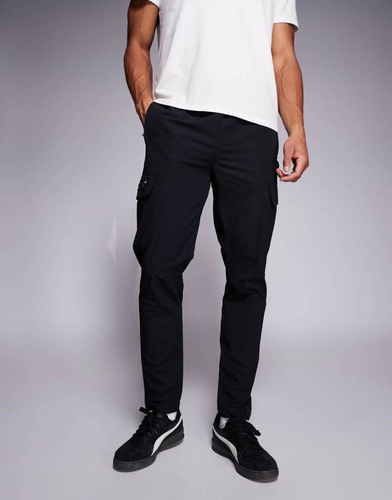 River Island - Enge Cargo-Hose in Schwarz River Island - Enge Cargo-Hose in Schwarz von River Island