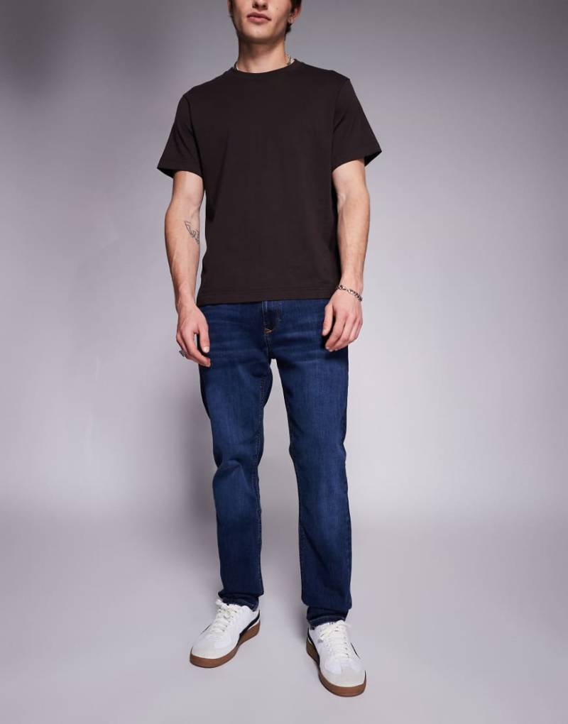 River Island - Enge Jeans in dunkelblauer Waschung-Marineblau von River Island