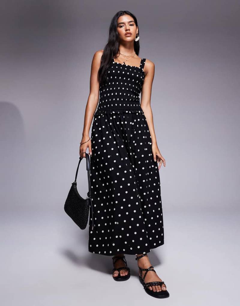 River Island - Gesmoktes Midikleid in gepunktetem Schwarz von River Island