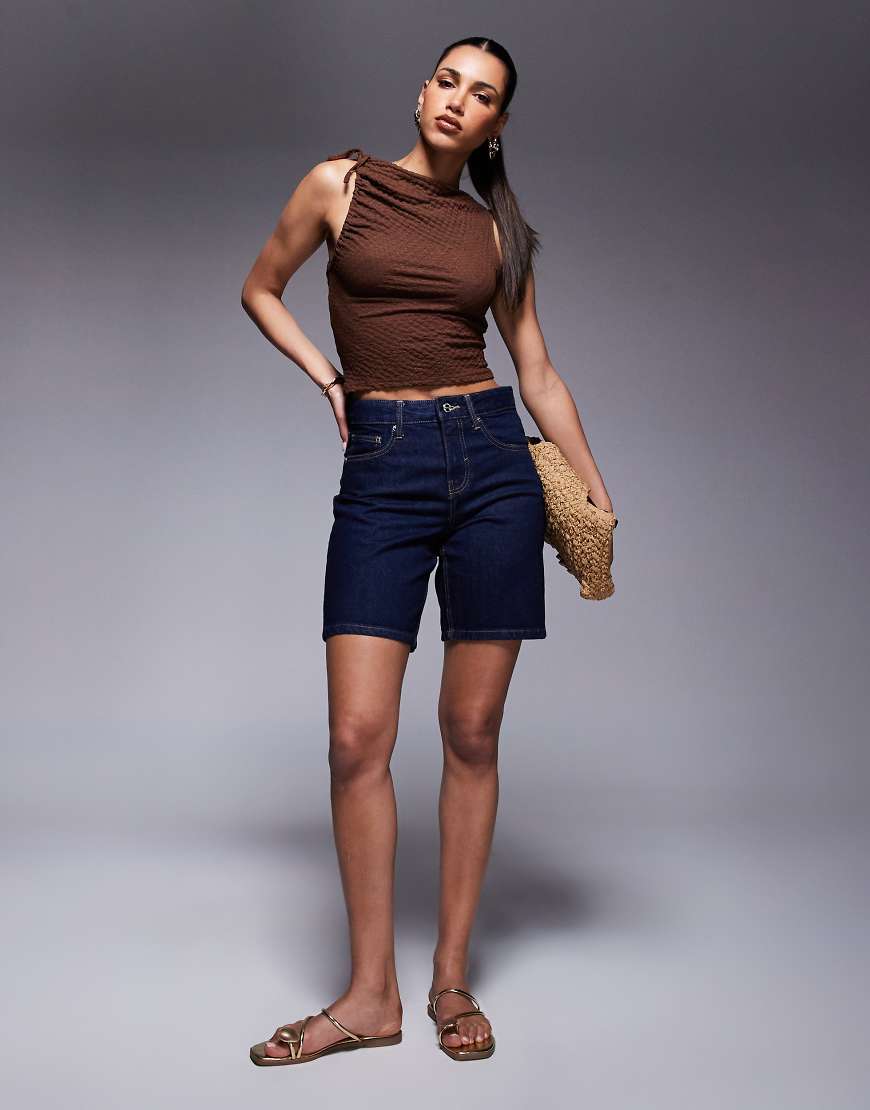 River Island - Jeans-Bermudashorts in dunkelblauer Waschung River Island - Jeans-Bermudashorts in dunkelblauer Waschung von River Island