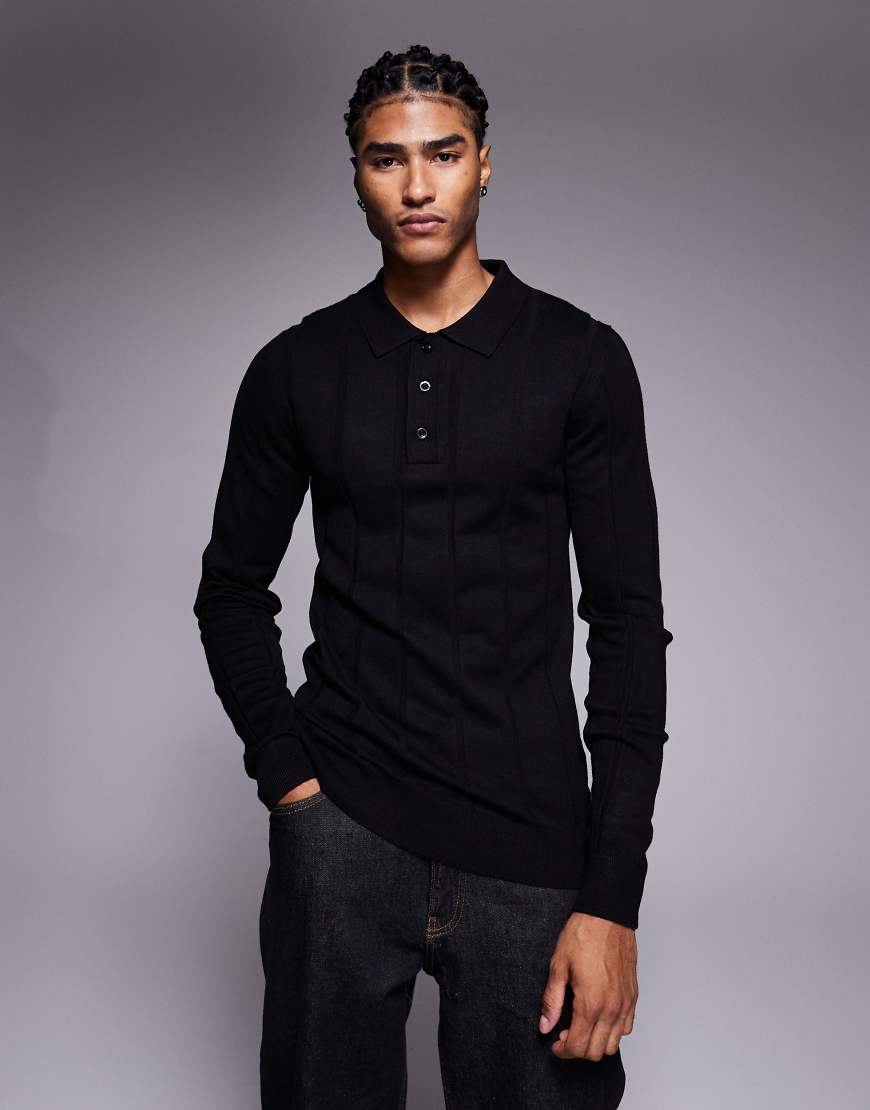 River Island - Körperbetontes Polohemd aus Rippstrick in Schwarz River Island - Körperbetontes Polohemd aus Rippstrick in Schwarz von River Island