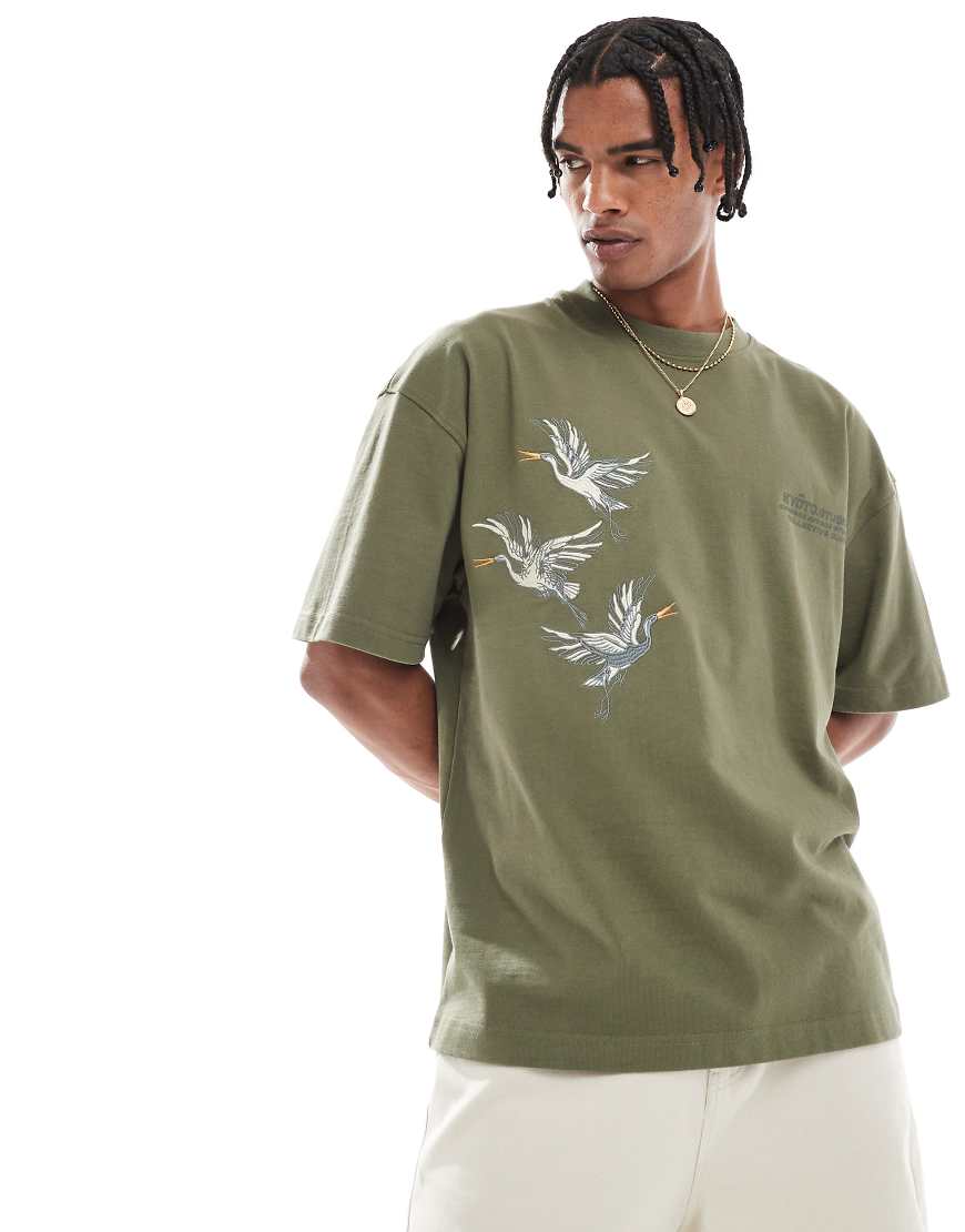 River Island - Kyoto Studios - Oversize-T-Shirt in Khaki-Grün River Island - Kyoto Studios - Oversize-T-Shirt in Khaki-Grün von River Island