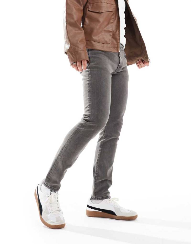 River Island - Mercury - Eng geschnittene Jeans in Dunkelgrau River Island - Mercury - Eng geschnittene Jeans in Dunkelgrau von River Island