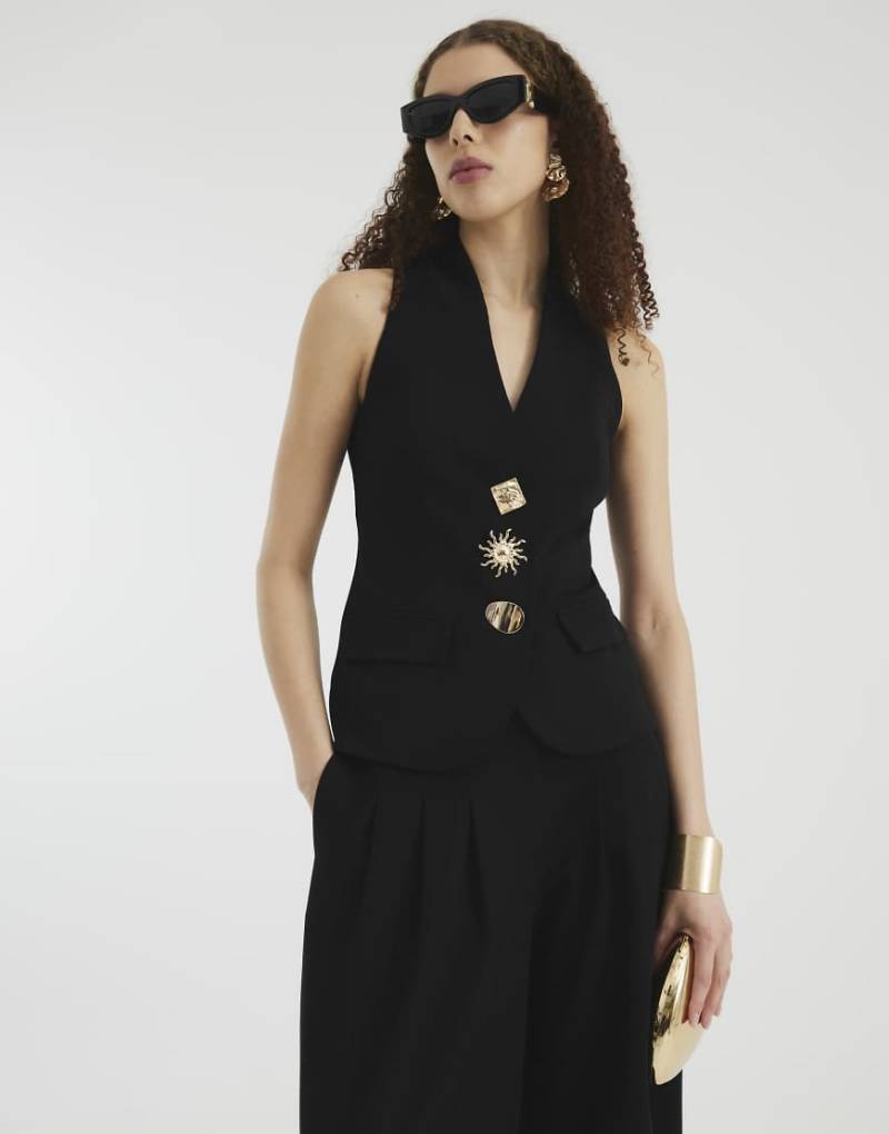 River Island - Neckholder-Weste in Schwarz mit Knopfleiste von River Island