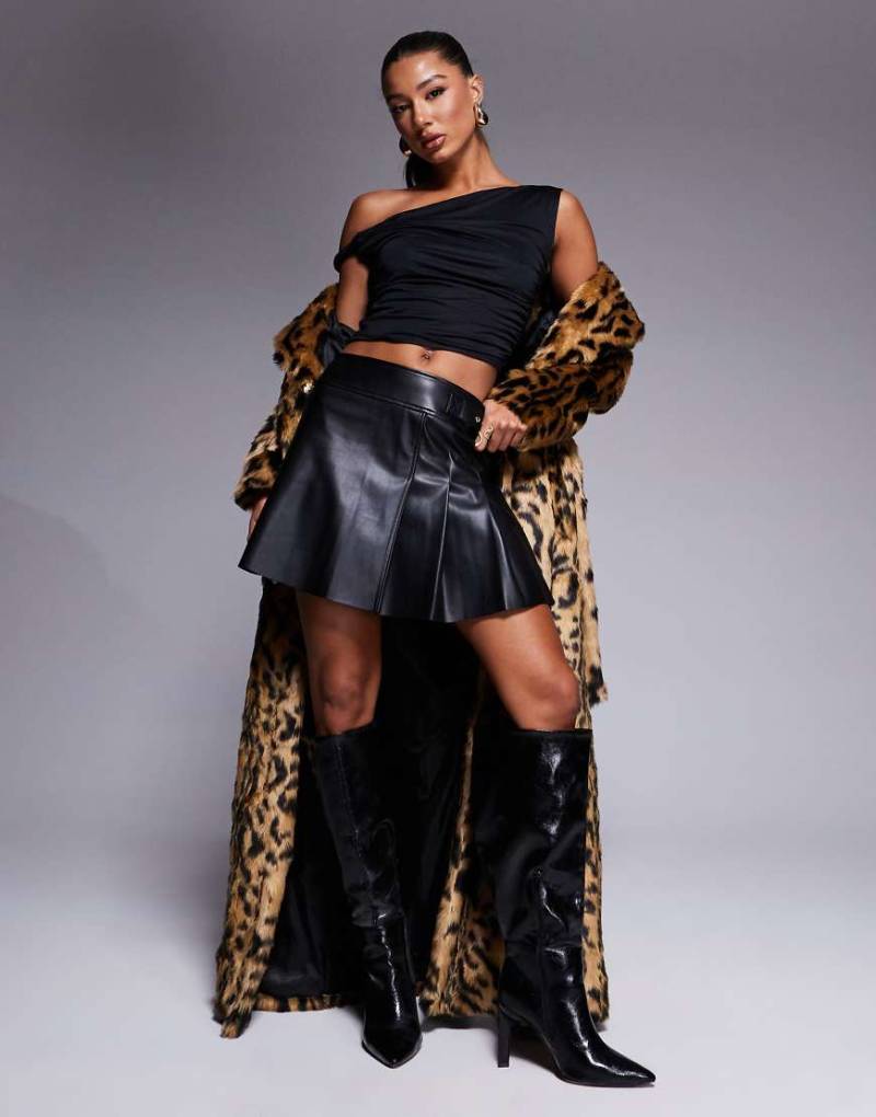 River Island - Plissierter Minirock aus Lederimitat in Schwarz von River Island