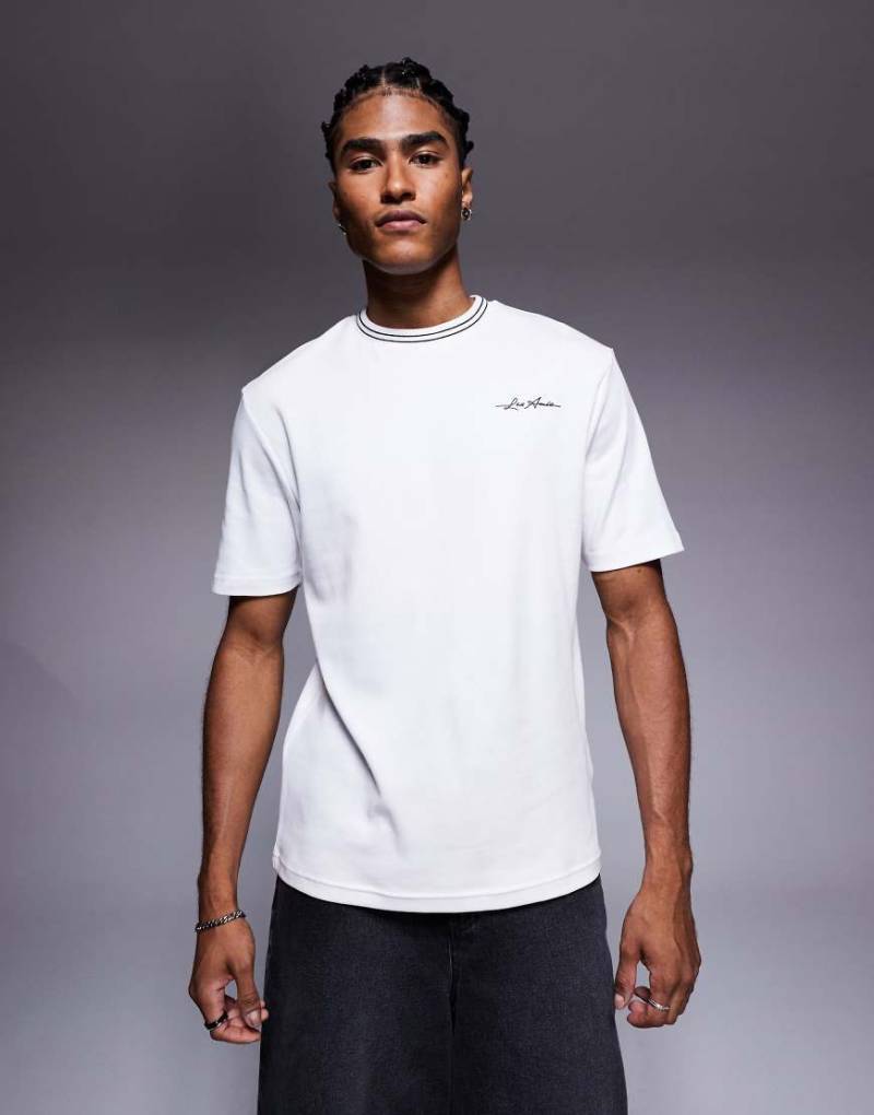 River Island - Ringer-T-Shirt in Weiß mit kontrastierendem Schwarz von River Island