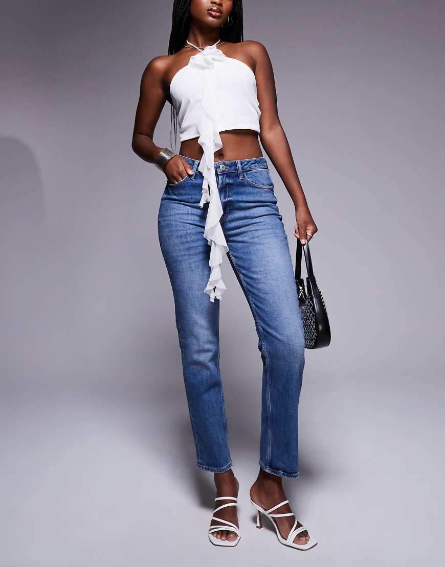 River Island - Schmal geschnittene Jeans in dunkelblauer Waschung von River Island
