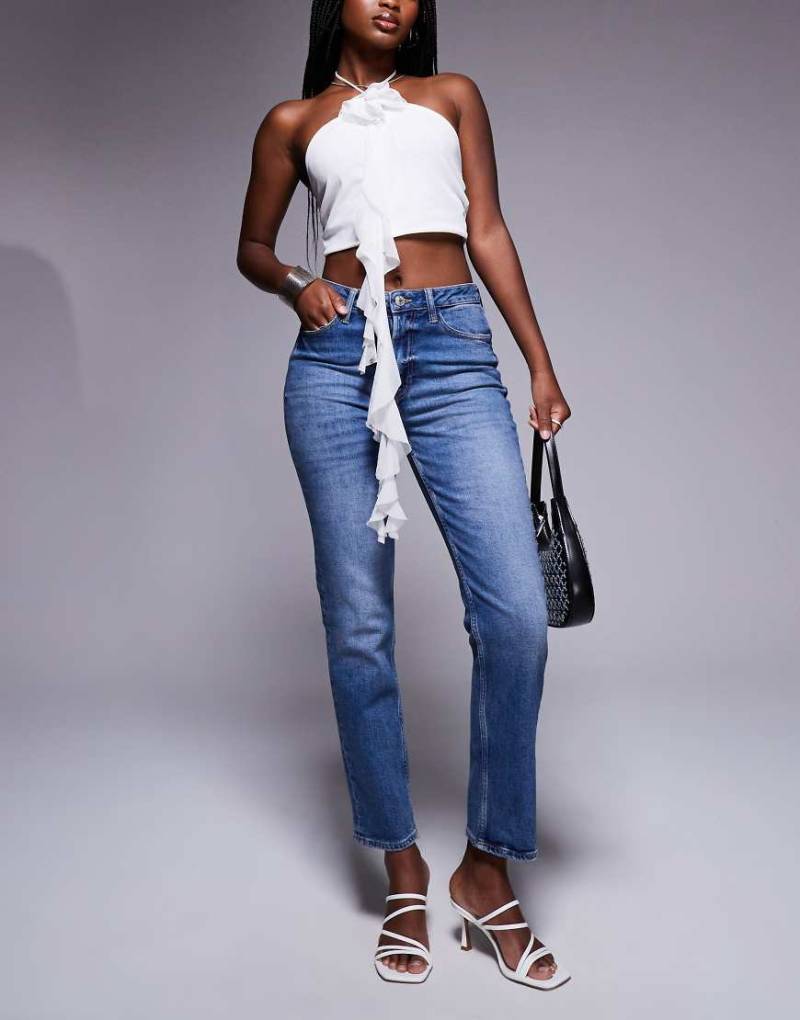 River Island - Schmal geschnittene Jeans in dunkelblauer Waschung von River Island