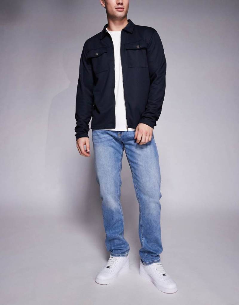 River Island - Schmale Jeans in mittelblauer Waschung von River Island