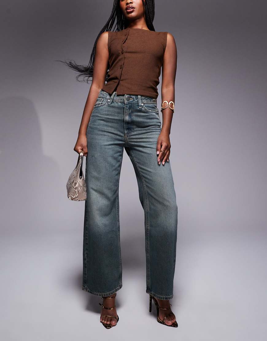 River Island - Straight Jeans in verwaschenem Dunkelblau mit lockerem Schnitt von River Island