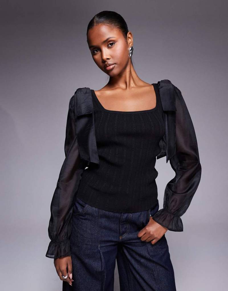 River Island - Strickoberteil in Schwarz mit Netzstoff-Ärmeln von River Island