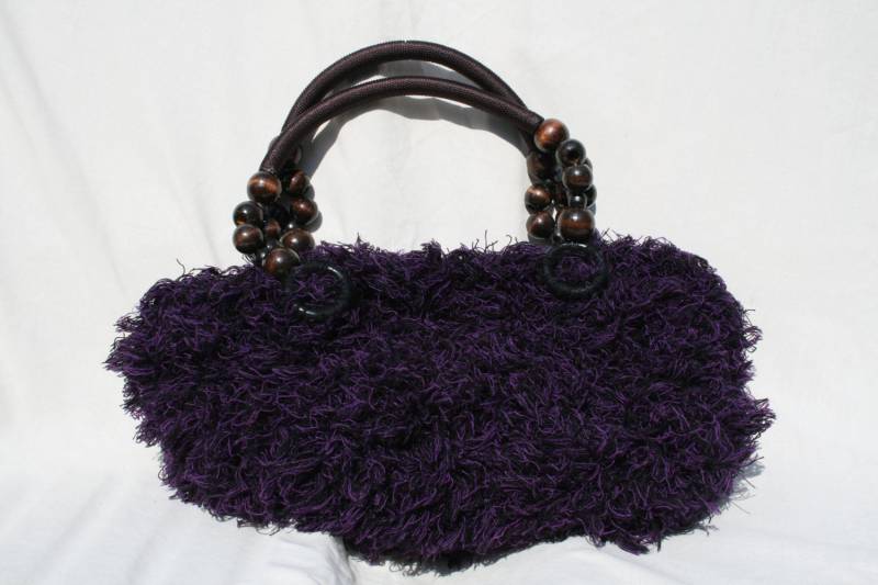 Lila Pudel Handgestrickte One-Tote-Handtasche Lila Pudel Handgestrickte One-Tote-Handtasche von Rizzknits
