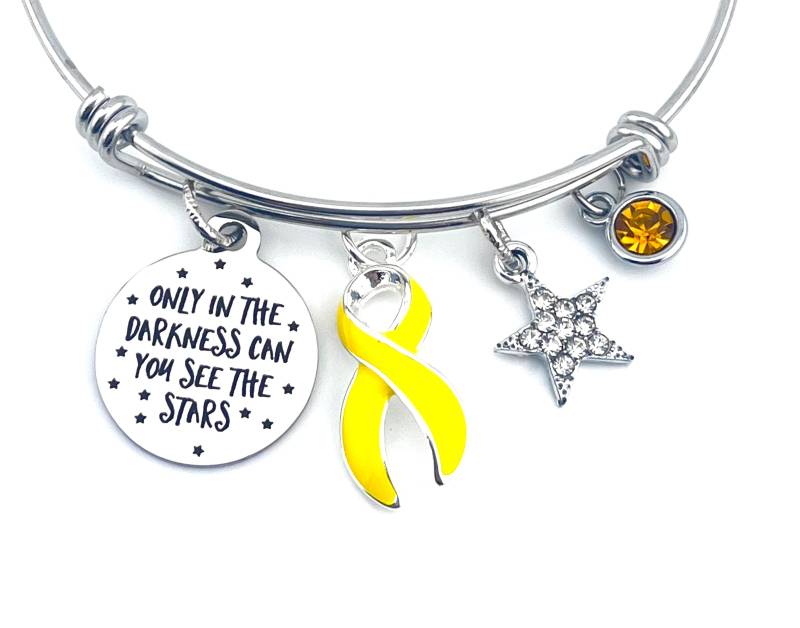 Gelbes Band Bettelarmband/Nur in Dunkelheit Adenosarkom, Blase Leber Knochenkrebs /Osteosarkom, Endometriose, Spina Bifida von RockYourCauseJewelry