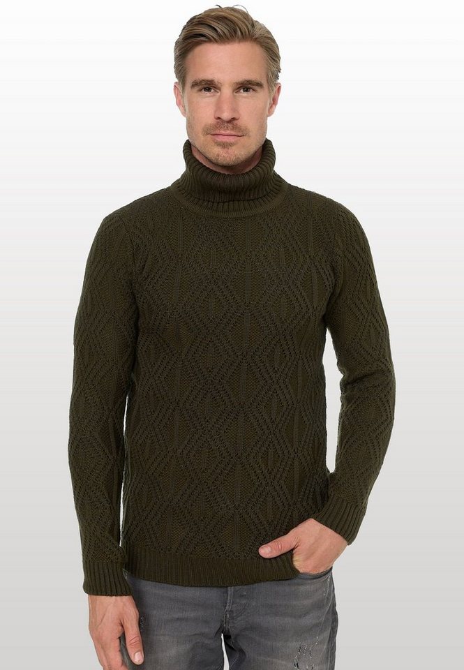 Rusty Neal Rollkragenpullover in modischem Design von Rusty Neal