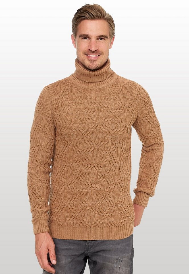 Rusty Neal Rollkragenpullover in modischem Design von Rusty Neal