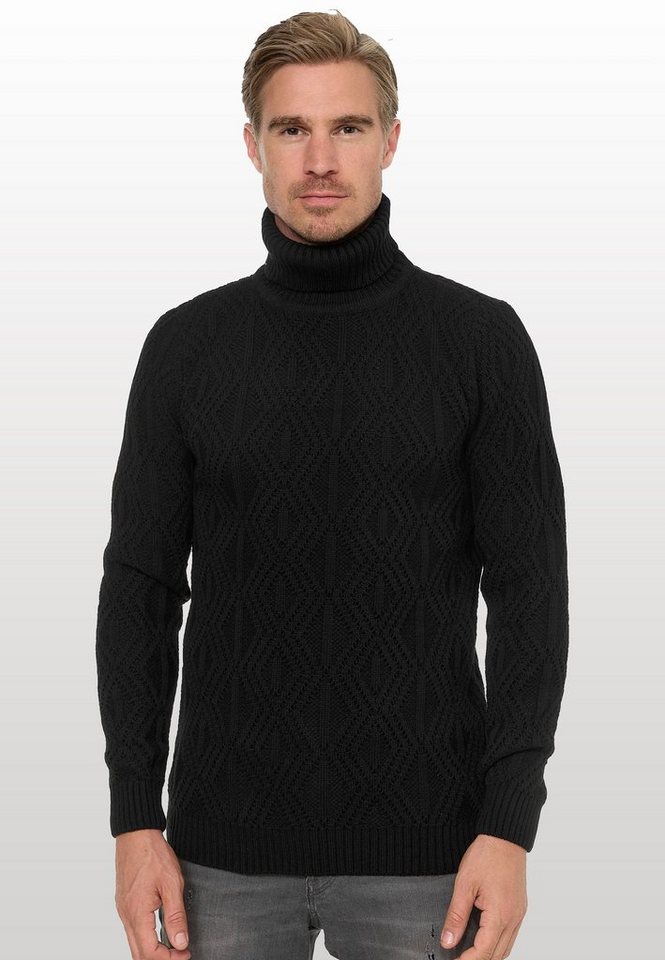 Rusty Neal Rollkragenpullover in modischem Design von Rusty Neal