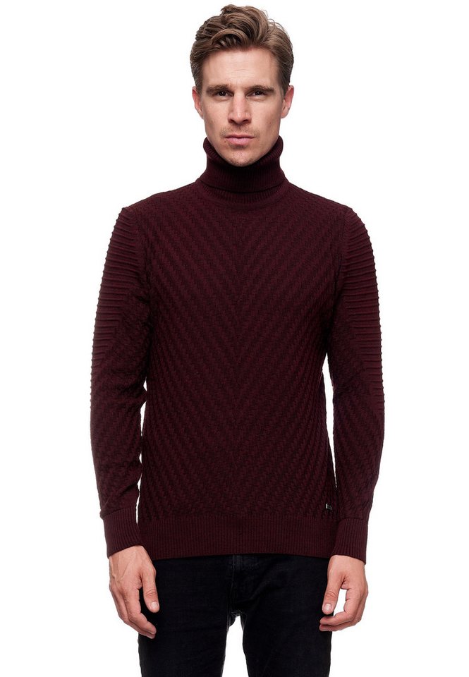 Rusty Neal Rollkragenpullover in stilvollem Feinstrick von Rusty Neal